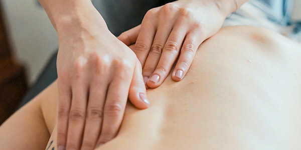 Precise, gentle manual therapy along the lower back